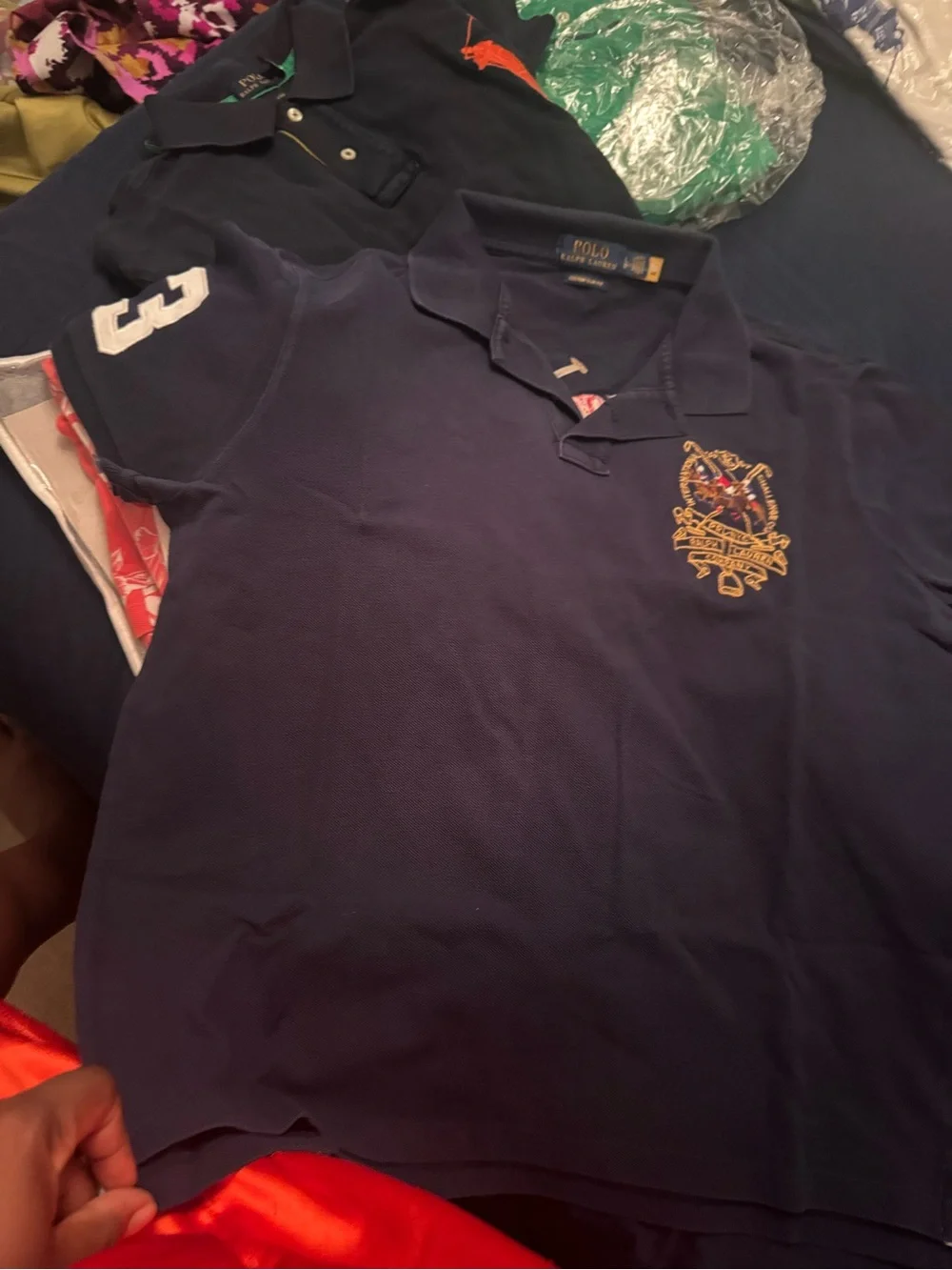 8 Men’s Ralph Lauren polo  shirts, $50 each